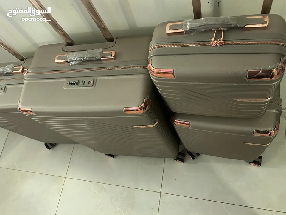 4 piece Travel bags Morano Rose gold bags - Medinah only