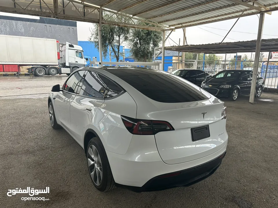 Tesla Y 2023 long range عداد 3000 ميل