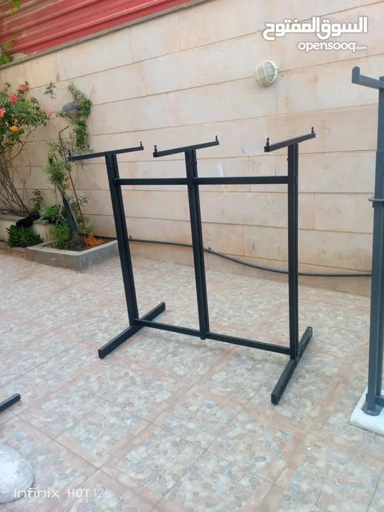 ستاندات ملابس حديد تفصيل مقاوم للكسر خاص بمحلات الملابس