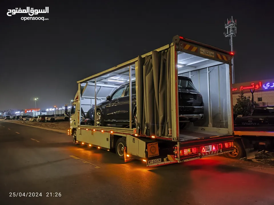 سطحة فل داون مغلقة لنقل السيارات من قطر الى دبي وبالعكس