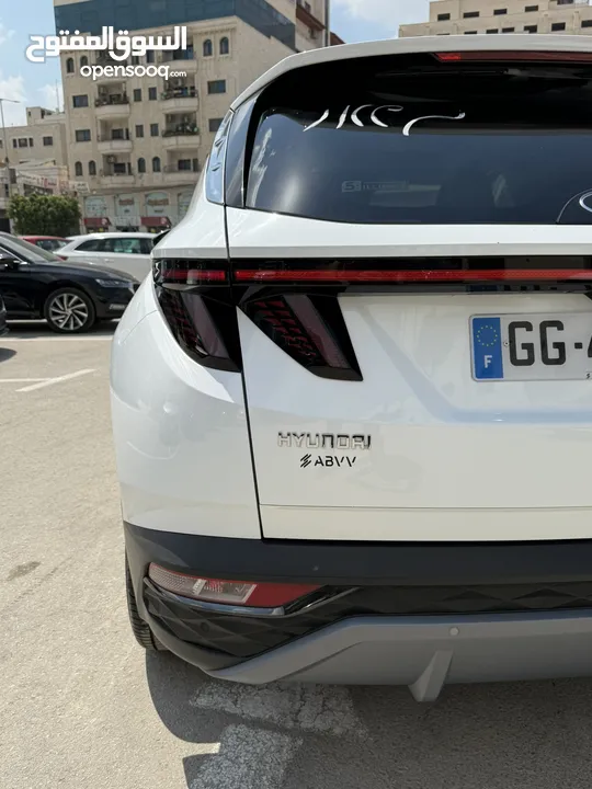 هونداي توسان ترخيص 2022 محرك 1600 هايبرد plug in/يقطع على الشحنه 52 كيلو متر