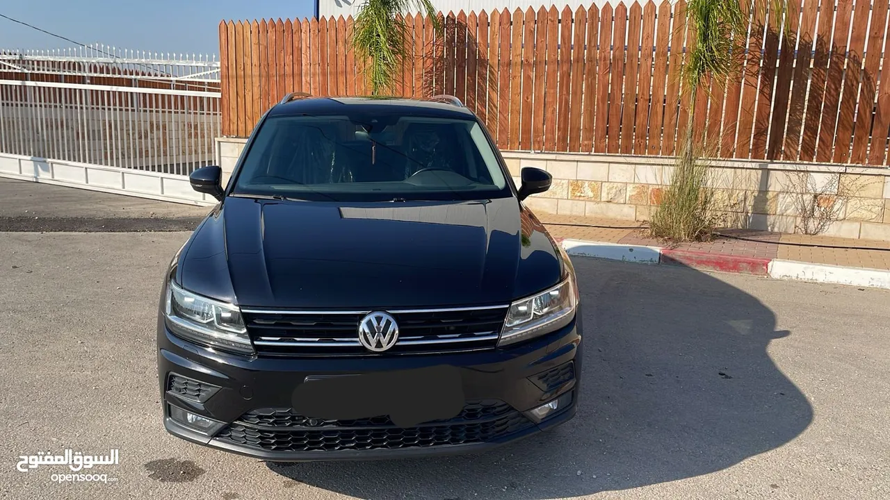 جيب تيجوان بنزين ماطور 2000 190hpصنع شهر6 2020 ولا غرام بوية ترخيص+تأمين شامل سنة كاملة لشهر 10/2026