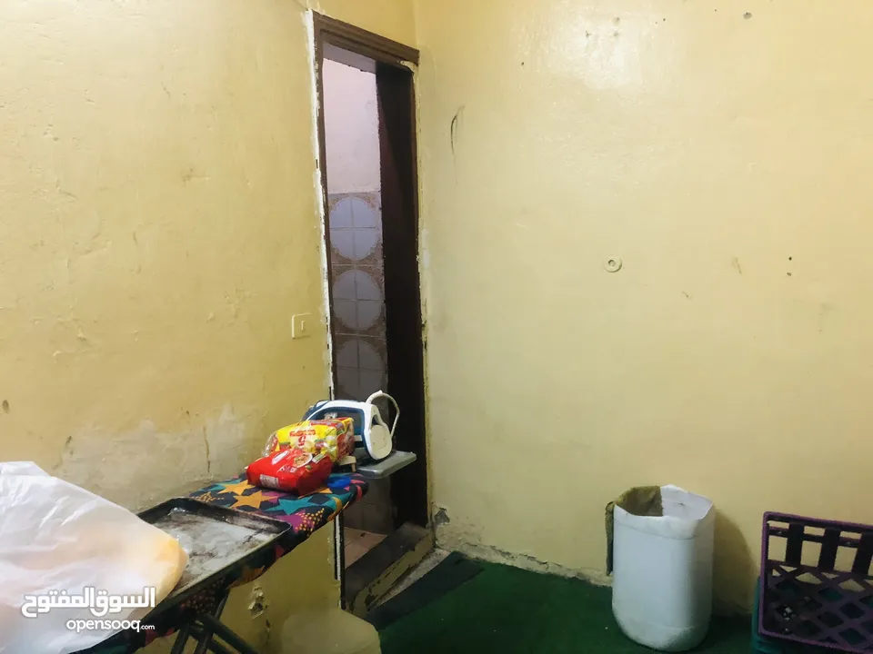 Room for rent semi furnished with separate bathroom close to masjid in Khamis Mushyath