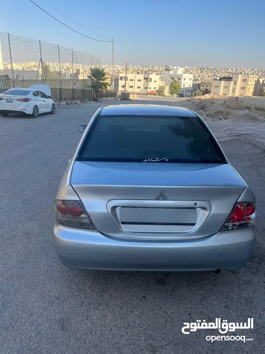 متسوبيشي لانسر 2004محدثه بالكامل 2013