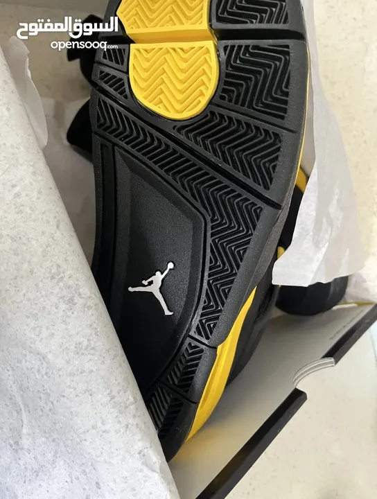 Jordan 4 Retro 2023 Thunder New in box Men’s (Size 9.5 US/43 EU) Black/White-Tour Yellow