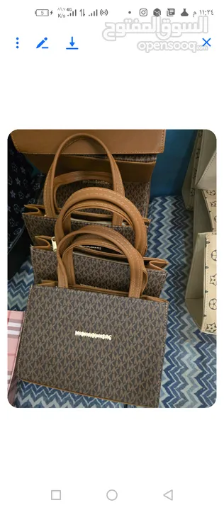 ماركت مايكل كورس.LV.شانيل