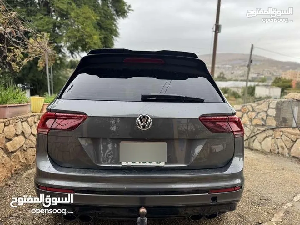 فولكس. فاجن تيجوان مطور 2000 ار لاين 4*4 فل اضافات كامل