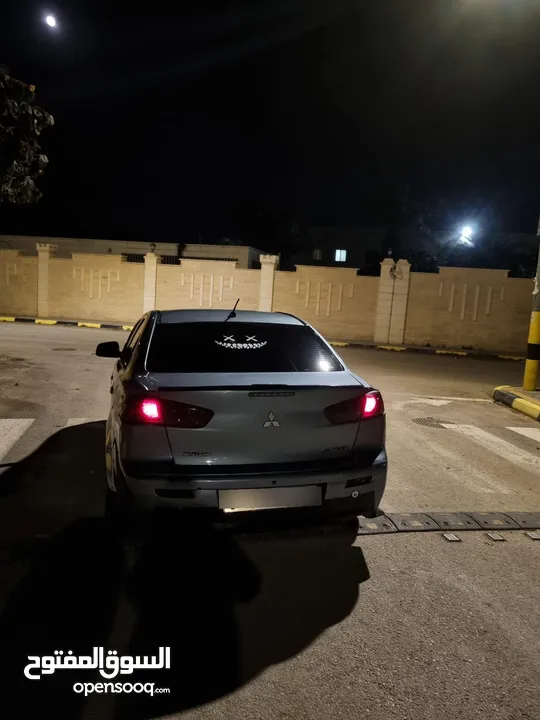 ميتسوبيشي فحص نظيف 100% موديل 2010 سياره كثير كثير ممتازه موتور 1005 جير موتور فحص 100% توماتيك المع