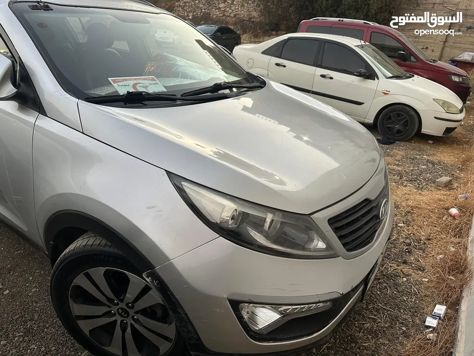 كيا سبورتاج2011 ديزل دفع رباعي ترخيص وتامين سنه فل اضافات بدون فتحه خاليه من الحوادث البيع كاش فقط