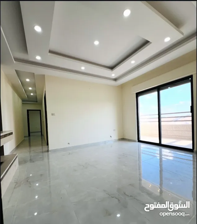 شقة جديدة للبيع ب حي المنصور طابق ثاني 170 متر مطله على شارع ياجوز وشارع الأردن راكب مطبخ ومكيفات