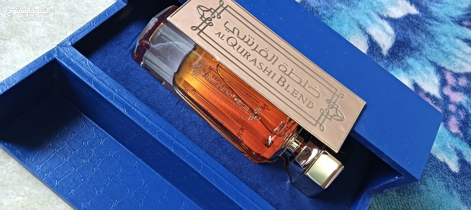 عطر خلطه القرشي جديد90مل للرجال والنساء  مع ستاند خشب لون ازرق