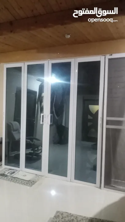 باب المنيوم سحاب دبل قلاس مع مناخل شبه الوكاله ولا شخط