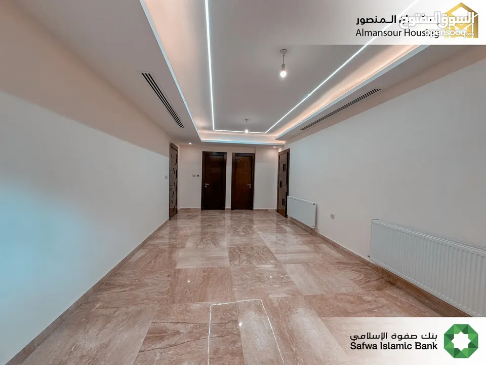 شقة ارضي معلق 190م2 يسار فاخرة للبيع في منطقة مكة مول/ مشروع مكة مول 5 (1/2) ( إسكان المنصور )