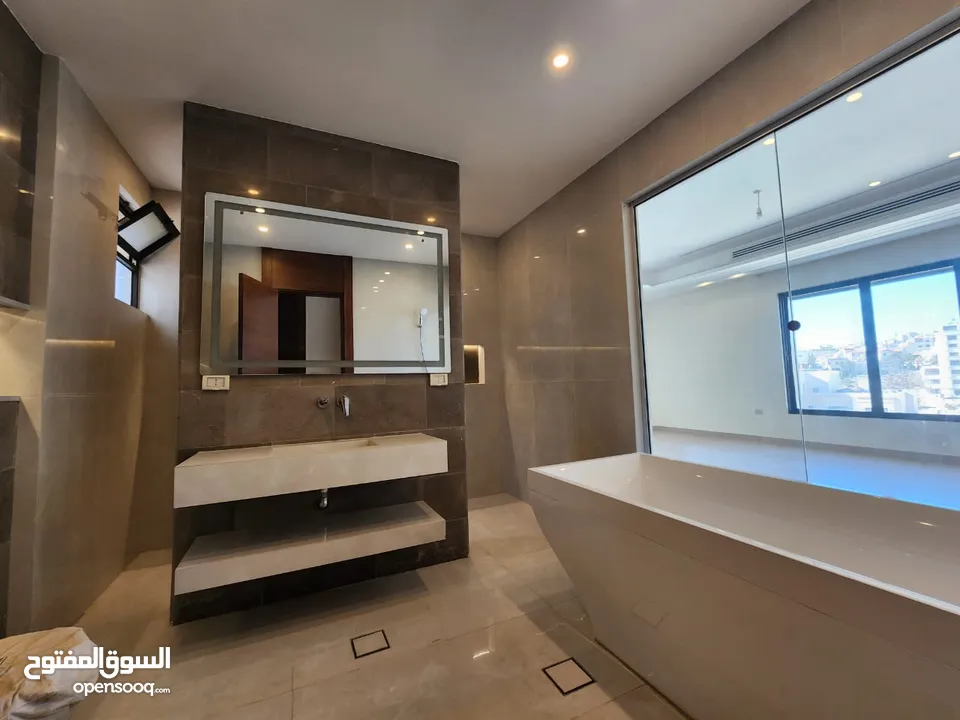 شقة طابقية فاخرة للبيع في عبدون  ref : 14389