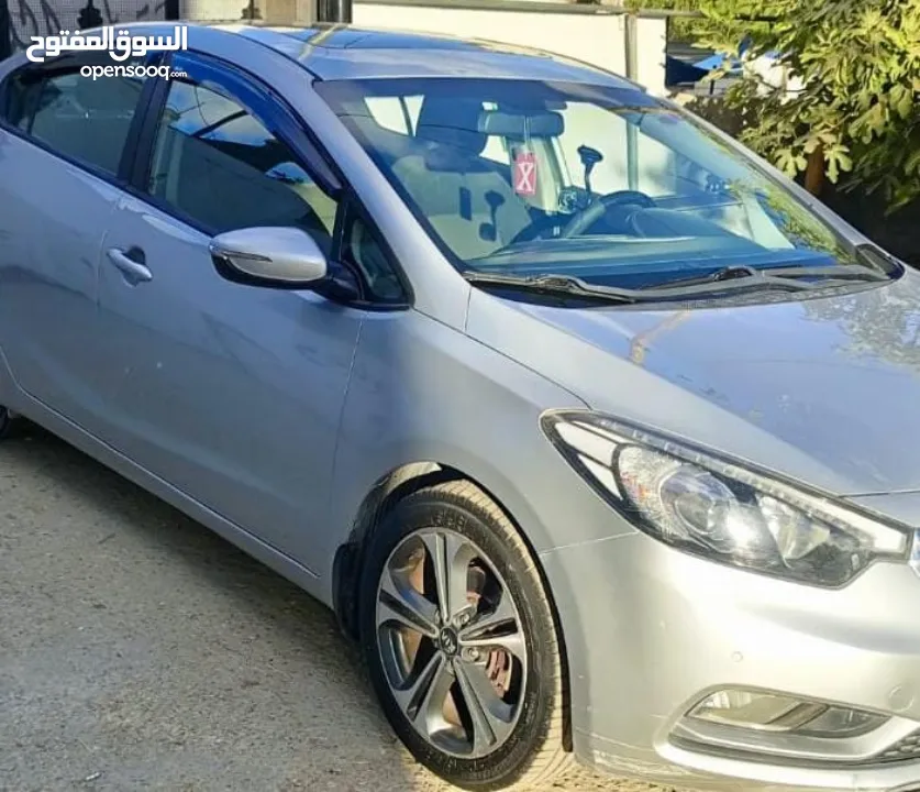 كيا سيراتو 2013 تسيير 2014 مع فتحة عداد قليل فحص ممتاز