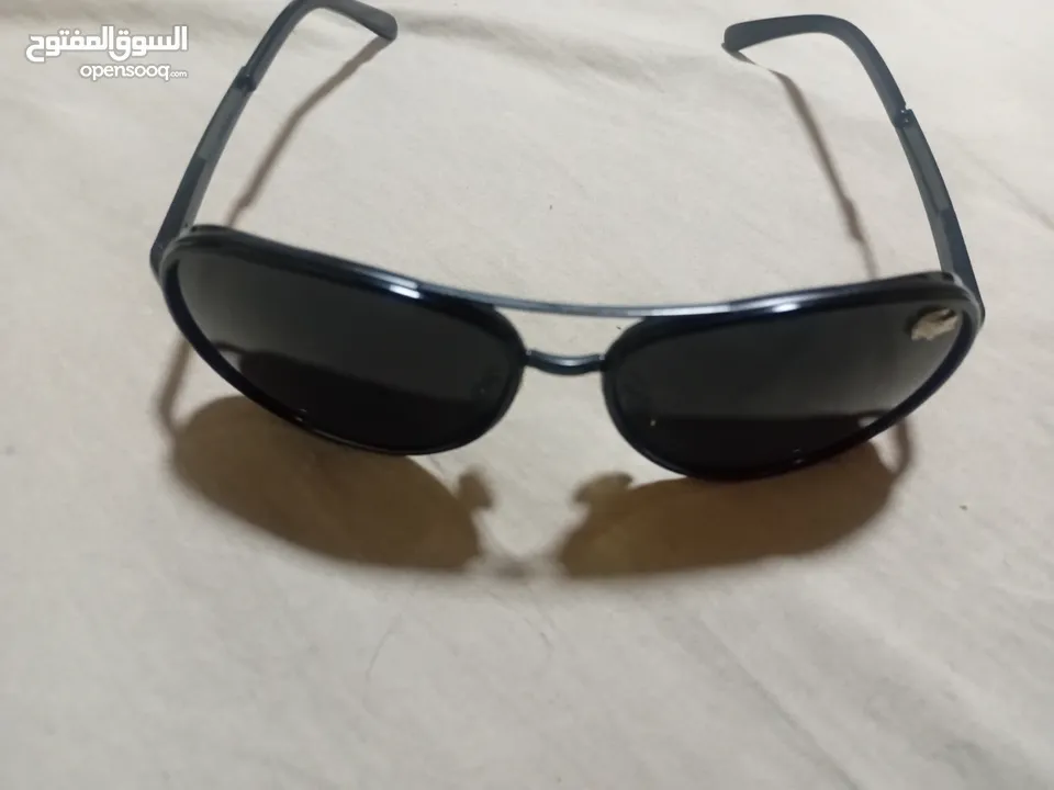 نظارة لاكوست استخدام خفيف  أصلية بحالة ممتازة
