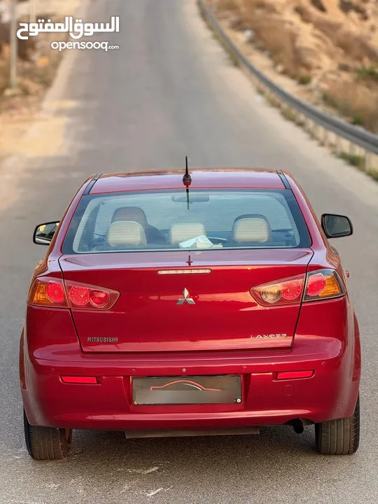 لانسر 2010.اصل خصوصي.بحاله ممتازه .فحص نضيف .اتماتيك .بنزين .رام لله او الخليل