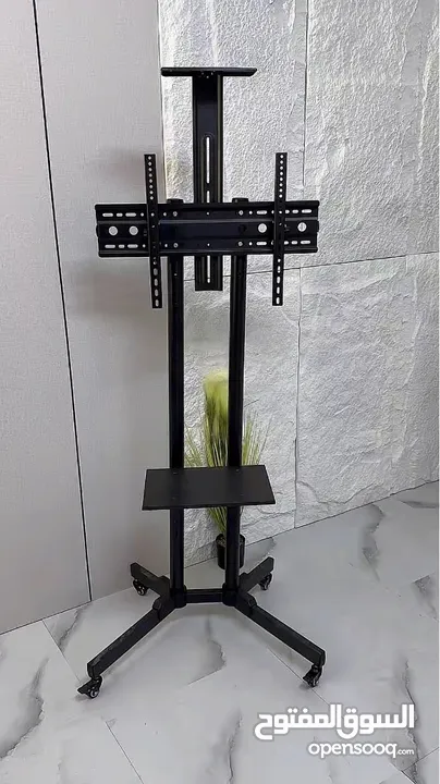 ستاند تلفزيون متحرّك بجودة عالية وتصميم عصري لو عندك شاشة كبيرة وبدك حامل قوي وثابت او بدك تنقل شاشة