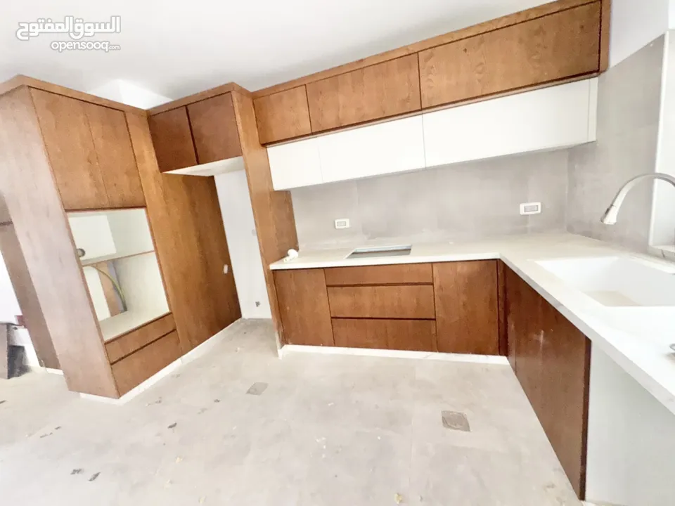 شقق للبيع في عين منجد