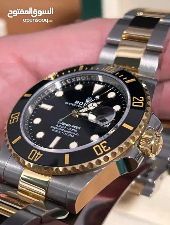ساعة Rolex Submariner Silver and Gold Oyster Bracelet wBlack Bezel فيرست كوبي
