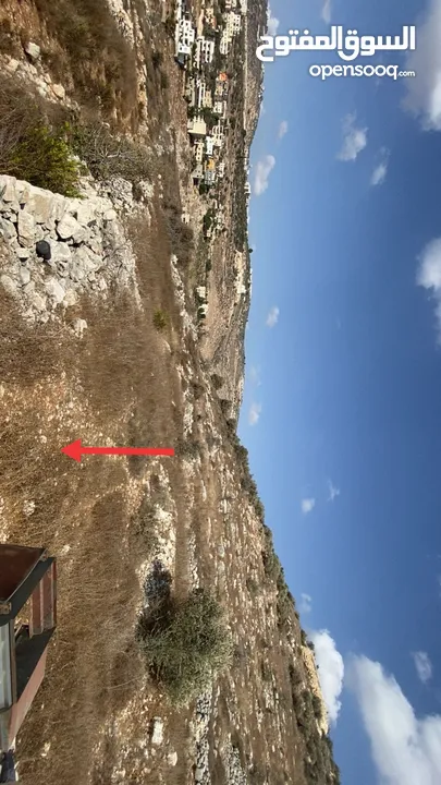 نص دونم كوشان نظيف عنبتا تصنيف A منطقة جبل الشيخ عيسى اطلالة مميزة طريق واصل خدمات قريبه