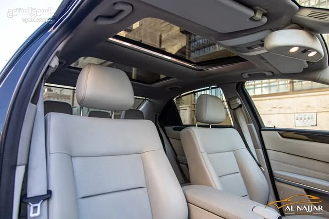 Mercedes E200 Avantgarde Amg kit 2015  السيارة وارد و بحالة الوكالة