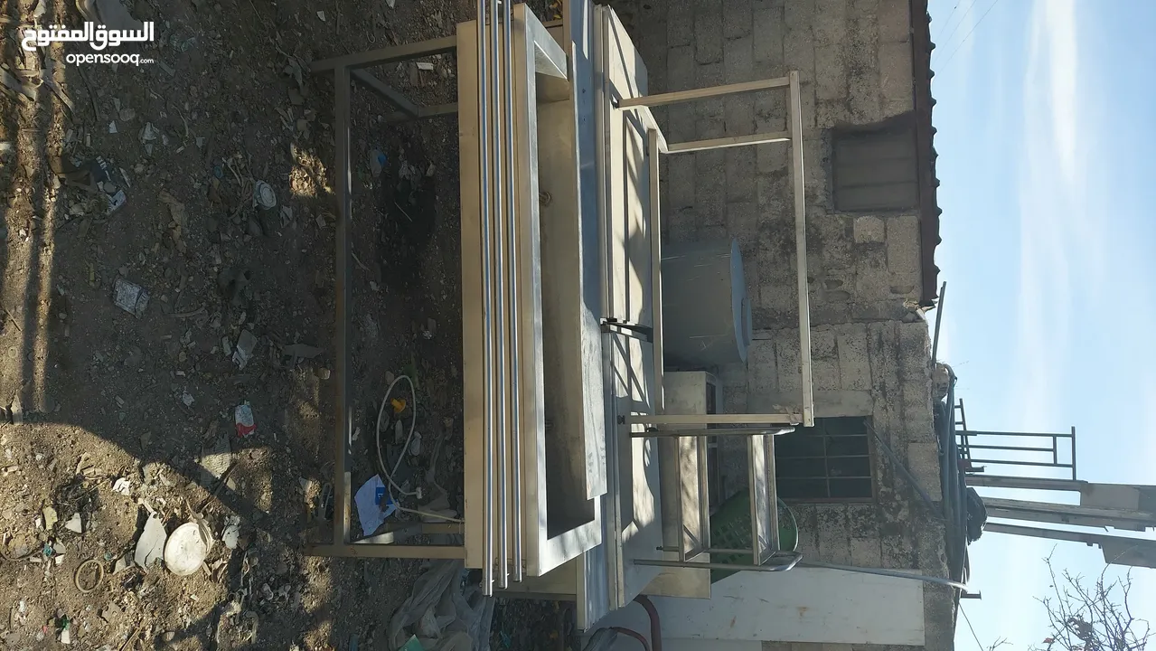 بواب شبابيك مطابخ مراجيح  بواب سحاب ماكنات خياطه ماكنات طباعه ماكنات تصوير وثائق خزانات ستيل