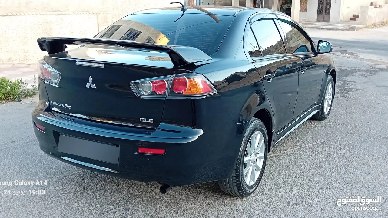 متسوبيشي لانسر فراشة موديل 2015 فحص مرفق مع الصور بحالة الوكاااااالة  ماشية 49 الف km  أصلي