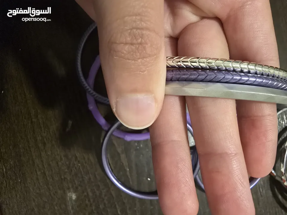 اساور بلاستيك بنفسجي، وفضي عدد 15