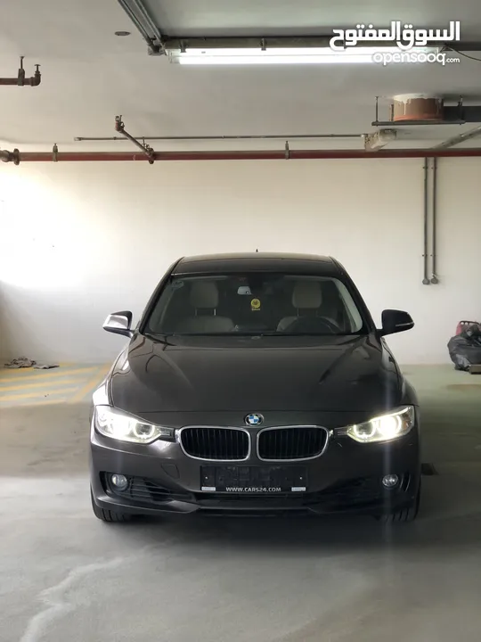 BMW320i 2014 Gcc full opinion without sunroof original paint first owner