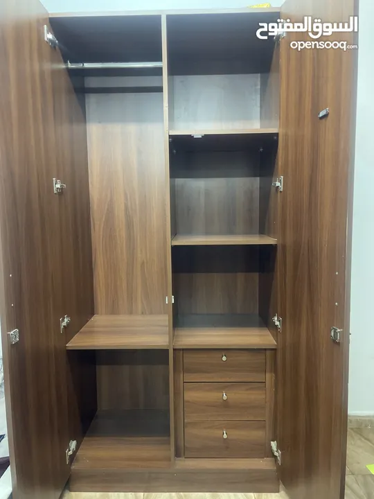 Wood cupboard nd dressing table with drawers