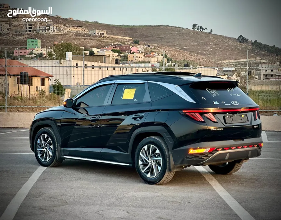هونداي توسان/2022 فل الفل فتحة سقف بانوراما  2x4 ///240Hp بنزين + كهرباء  ( Haybrid) 1600cc