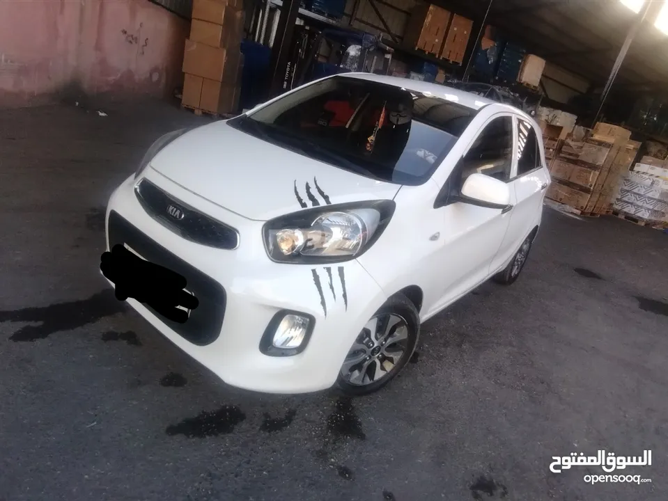 كيا مورنينج 2016 لون ابيض عاجي