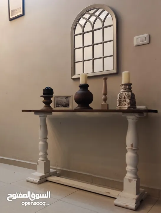 قنصل خشب مع مرايه
