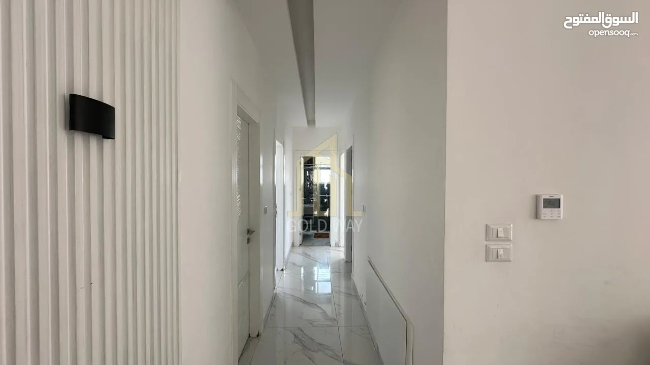 في أجمل مناطق الرابيه شقة أرضيه 196م مع ترس 50م بتشطيبات راقية / ref 9547