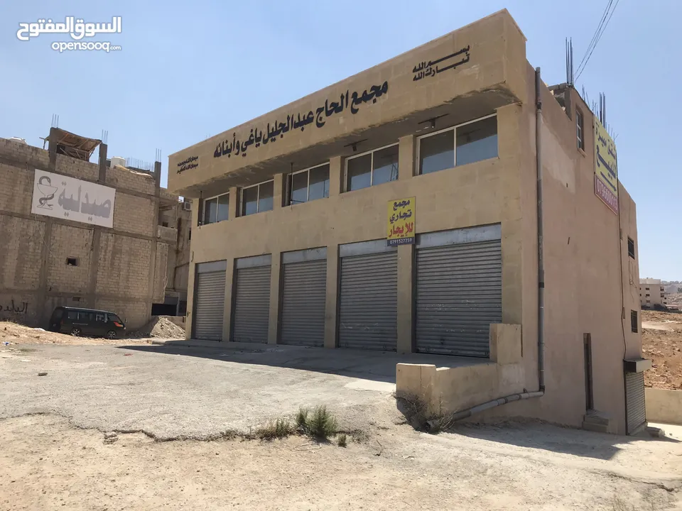 محلات تجارية عدد 3 مفتوحين على بعض - عين الباشا ش. تجاري حيوي الباب 195 شهري