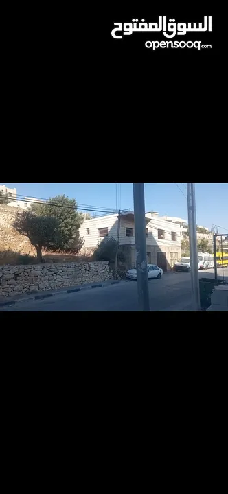 قطعه ارض مع بناء للبيع