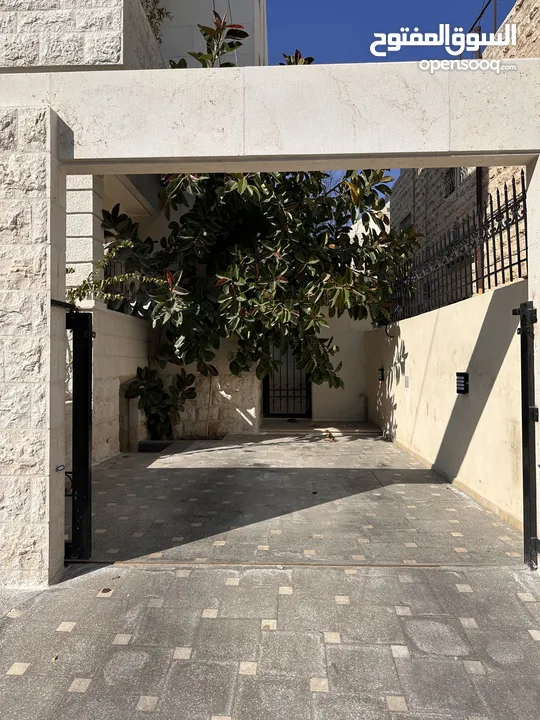 Modern 3-Bedroom Apartment with Garden & BBQ Area in Vibrant Jabal Al-Weibdeh