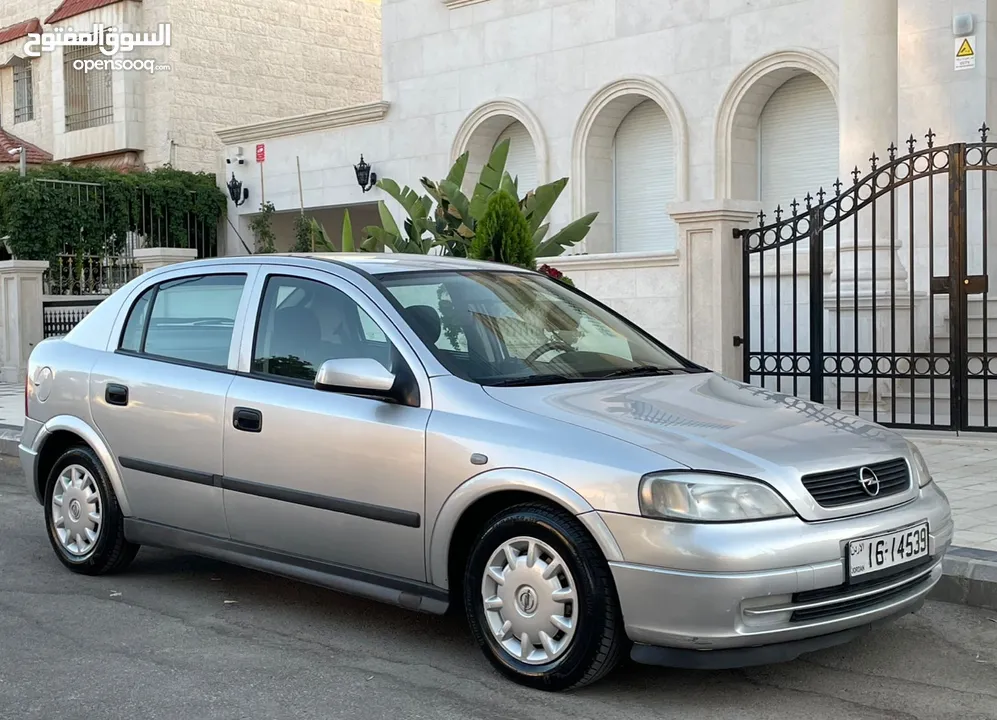‎أوبل استرا موديل 2001  وارد الوكالة ومالك واحد فقط من الشركة عداد 100الف كيلو فقط