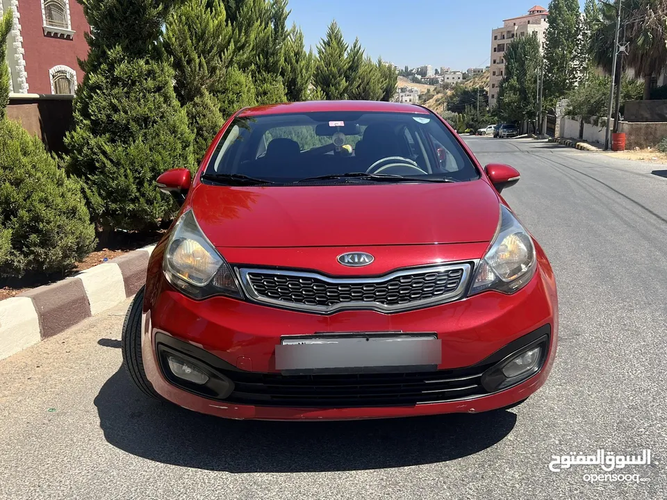 ماشيه 95000 فقطKia rio فل كامل عدا الفتحه