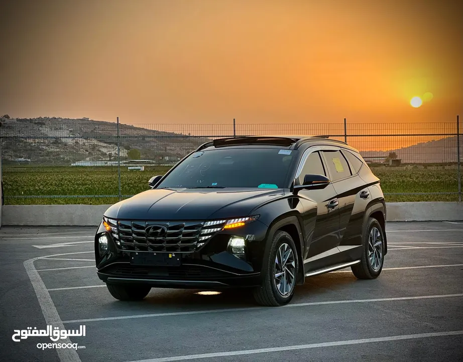 هونداي توسان/2022 فل الفل فتحة سقف بانوراما  2x4 ///240Hp بنزين + كهرباء  ( Haybrid) 1600cc