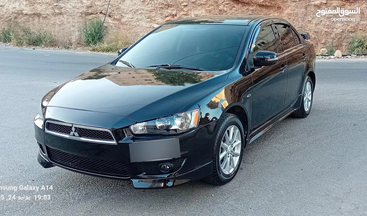 متسوبيشي لانسر فراشة موديل 2015 فحص مرفق مع الصور بحالة الوكاااااالة  ماشية 49 الف km  أصلي