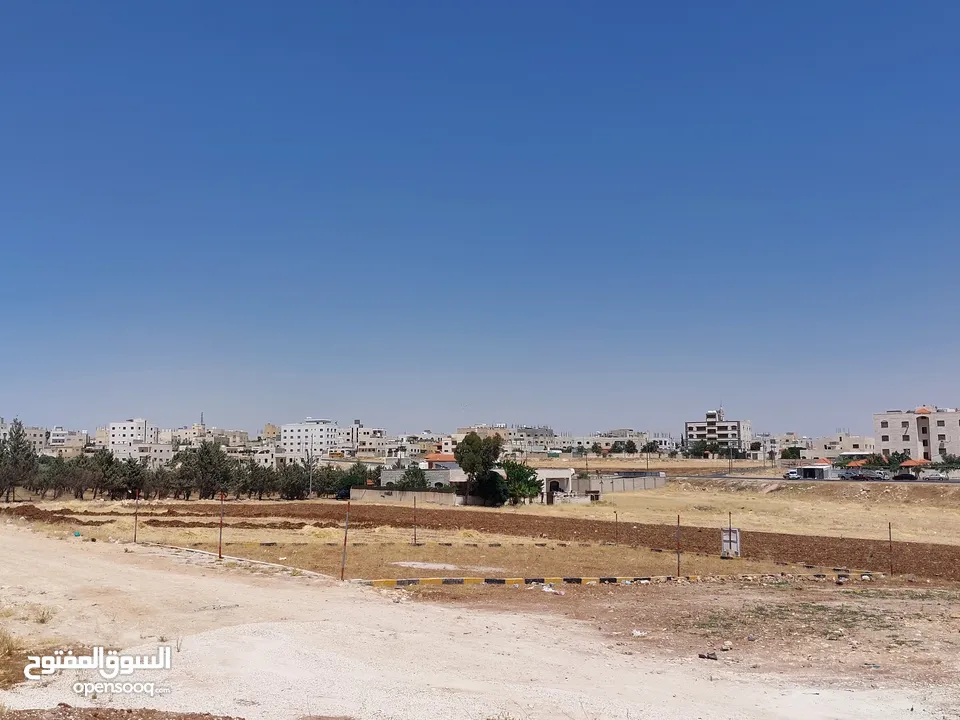 ارض نص دونم  في منطقة جاوا قرب مدارس الضاحية