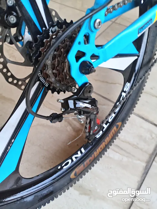 دراجة هوائية من نوع SPORTS INC من طراز SHIMANO جنط 26 باللون الأزرق اقرأ الوصف بدقة قابل للتفاوض