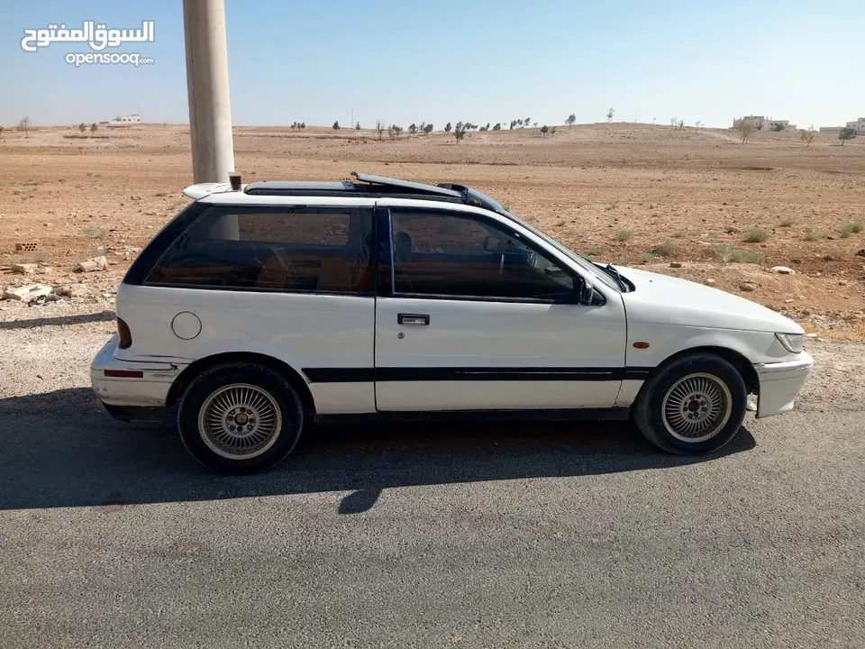 متسوبيشي ميراج 1990 ابيض باب واحد