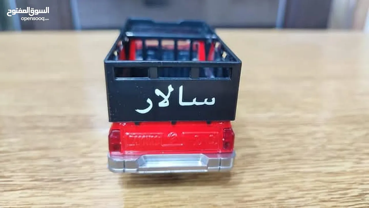 مجسم بكم جونيور حديد قياس 1/32 بفتح ابواب وكاله
