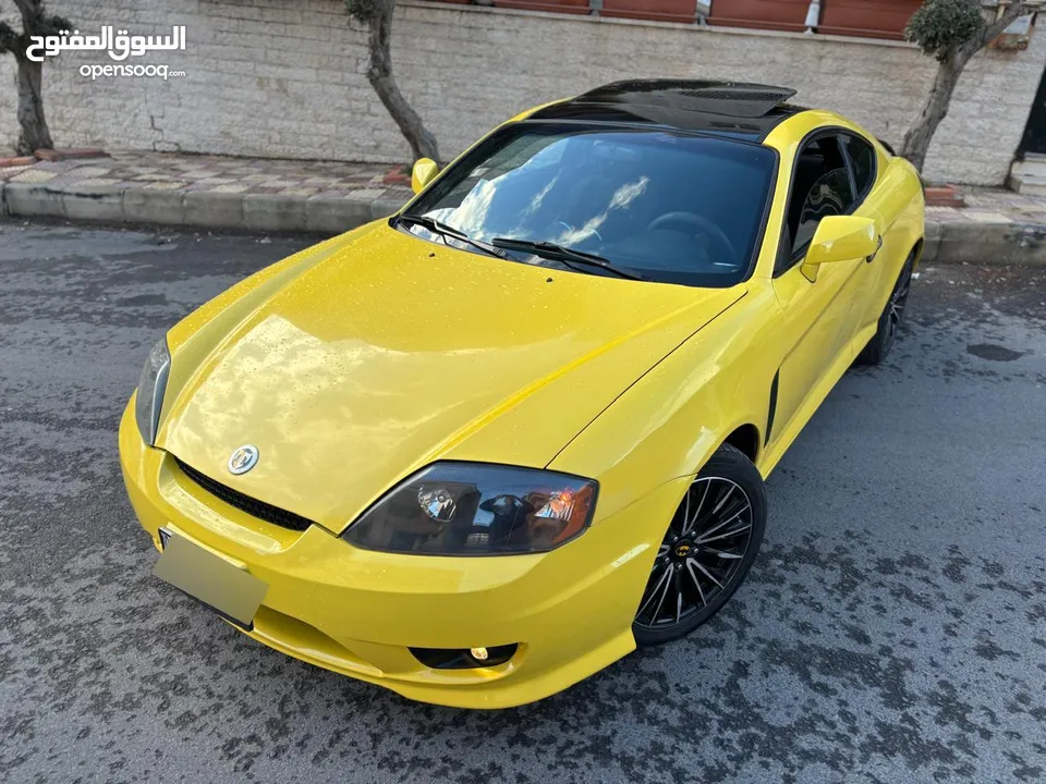 هونداي توسكاني شكل 2005 كامله الاضافات
