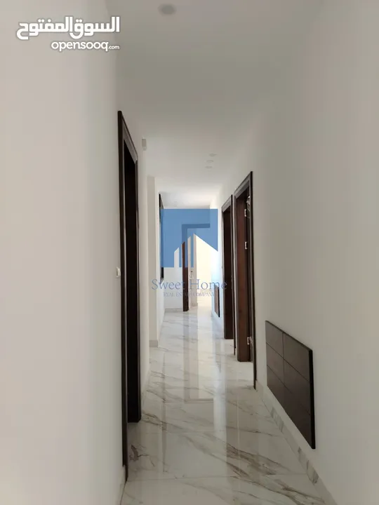 شقة أرضية فاخرة للبيع في خلدا  - خلف المستشفى السعودي 330م مع حديقة وترسات 100م لم تسكن