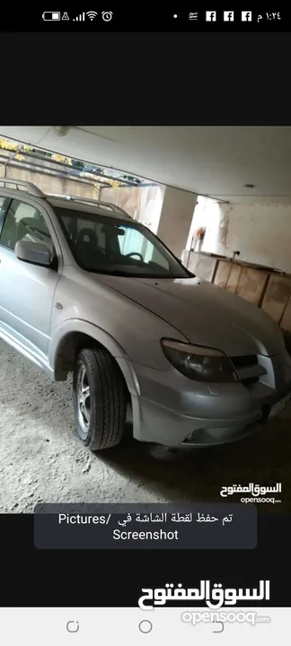 ميتسوبيشي آوتلاندر 2006 للبيع بحالة ممتازة موتور 2400 جير توبترونك دفع رباعي جلد فتحة وفتحة ثانية با