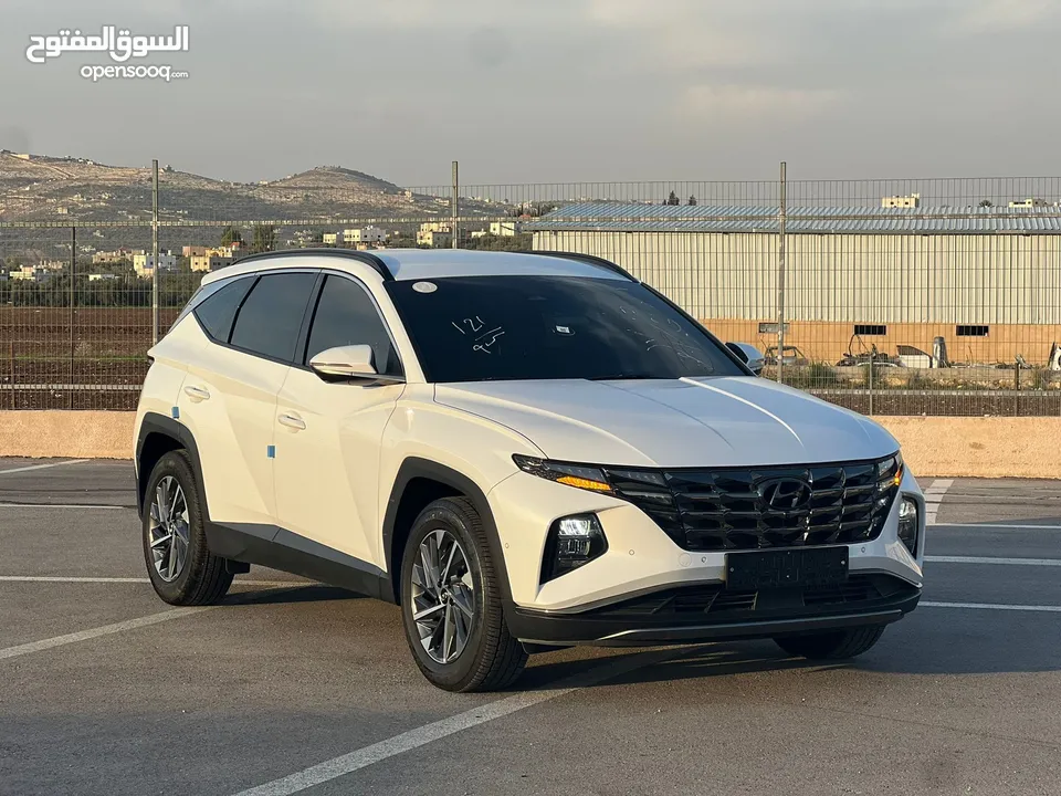 هونداي توسان /2022 فل الفل بدون فتحة سقف  2x4 ///240Hp بنزين + كهرباء  ( Haybrid) 1600cc